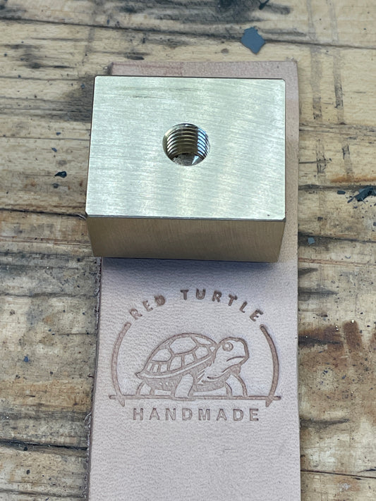 Stamp with threaded hole